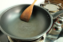 Scratches On The Teflon Frying Pan With Spatula On The Gas Stove, Sloppy Kitchen
