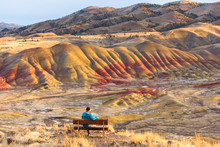 Bekah Herndon Takes In The Views Of Along The 3/4 Mile Carroll Rim Trail At The Painted Hills In The John Day Fossil Beds National Monument In Eastern Oregon.