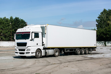 white truck with trailer