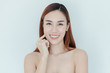 © fufupix - Pretty Asian girl with big eyes and dark eyebrows, with naked shoulders, beautiful woman looking at camera and smiling