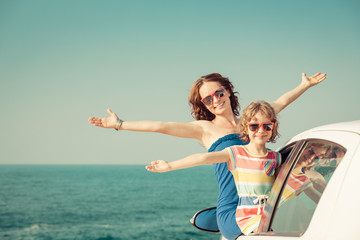 Happy family travel by car