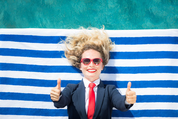 Wall Mural - Successful young businesswoman on a beach