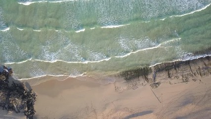 Sticker - girl walking on a deserted beach