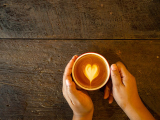 Wall Mural - Hot latte art on wood table