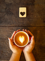 Wall Mural - Hot latte art on wood table