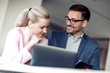 © ivanko80 - Business coworkers discussing new ideas