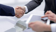 © ASDF - close up.handshake of modern business partners