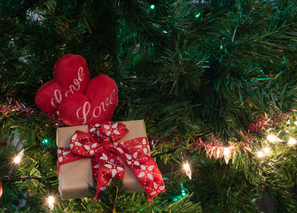 Wall Mural - Beautiful love hearts and home decorated christmas tree with baubles and gift boxes,Christmas background