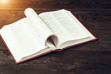 Wall Mural - The Holy Bible on a wooden table.