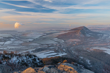 Wall Mural - Sunrise on Boren hill near Bilina town in winter frosty morning