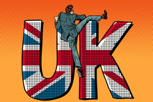 Businessman Overcomes The Border. UK Word Flag