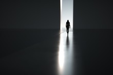 Silhouette Of Woman Goes On Abstract Way Through Light