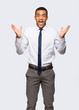 © luismolinero - Young afro american businessman with surprise and shocked facial expression on isolated background