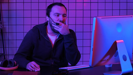developing programming and coding technologies. bored programmer working.