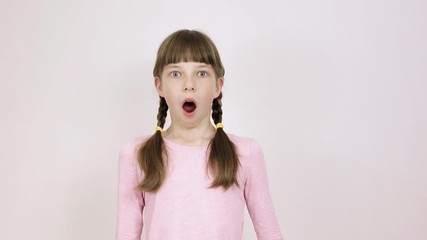 lifestyle teen girl shrugs and is perplexed