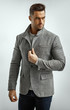 Portrait of handsome man in gray stylish jacket isoalted on white background