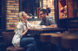 Beautiful couple on a romantic date in cafe - Image