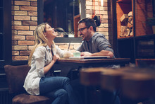 Beautiful Couple On A Romantic Date In Cafe - Image