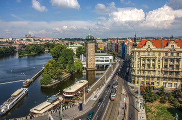 Canvas Print - Prague, Czech Republic - April 22, 2015: Quay in the center of Prague. Boat on Vltava river near Juraskuv bridge