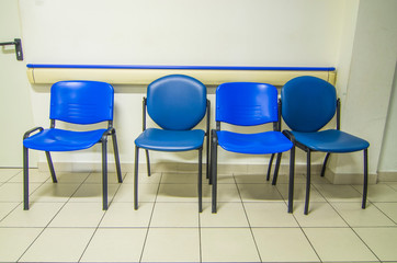 blue chairs in the waiting room