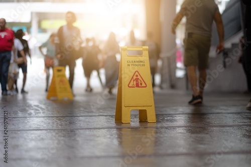 Fotografía Sign showing warning of caution wet floor in airport.