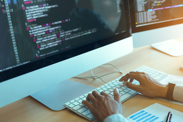 Asian man working code program developer computer web development working design software on desk in office.