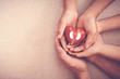 hands holiding red heart with kidney, world kidney day, organ donor day