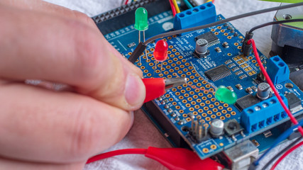 Wall Mural - Microcontroller build closeup showing components, board and shield