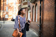 © Rawpixel.com - Woman drinking coffee out of a paper cup
