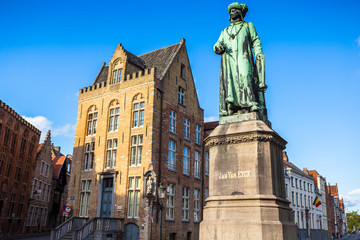 Bruges, Belgium - August 17, 2017: Statue of the Flemish painter Jan van Eyck in Bruges.