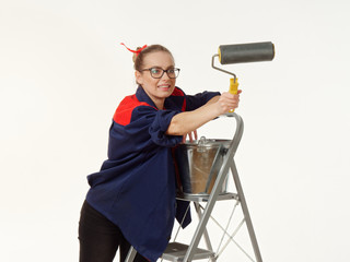 beautiful house painter on a stepladder on a white background.