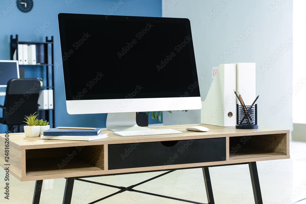 Comfortable workplace with modern computer in office