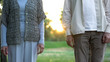 © motortion - Senior couple standing apart, medical insurance of elderly people, opinion poll