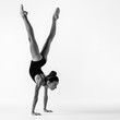 © Alexander Y - Young gymnast girl stretching and training