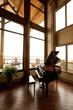© Mint Images - Baby Grand Piano in a Corner