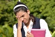 © dtiberio - Unhappy Female Student Wearing Uniform