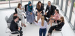 © InfiniteFlow - Businesswomen and businessmen attending group meeting conference in office room. Corporate business team concept.