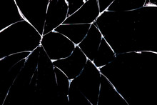 Cracks In Glass Are Isolated On A Black Background