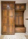 Fototapeta Big Ben - Retro closet made of wood in hallway interior