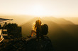 © Forrest Smith - silhouette of photographer at sunset in mountains