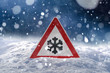 winter driving - risk of snow and ice - traffic sign