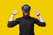 © Vulp - Man bearded gamer VR glasses playing virtual game. Win virtual reality concept