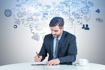 Wall Mural - Man writing in clipboard, business plan