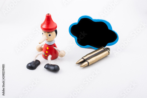 Pinochio toy figurine thinking of killing someone