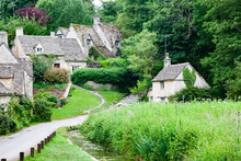 Traditional Cotswold Cottages In England, UK. Bibury Is A Village And Civil Parish In Gloucestershire, England