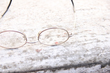 glasses on an old book