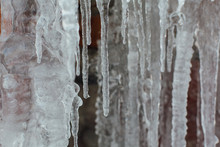 Very Large And Dangerous Icicles Close Up