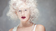 © Ulia Koltyrina - Young attractive woman with platinum blonde and purple lipstick