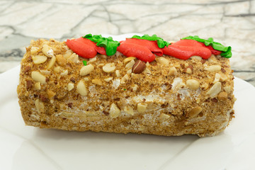 Granola bar with nuts fruit and berries on a white stone table Healthy sweet dessert snack Top view copy space