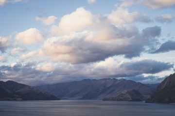 Sunset and clouds above a mountain landscape